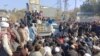 خلکو د پولیسو لخوا د نيول شويو کسانو خوشې کولو لپاره په سده کې مظاهره کړې