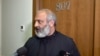Armenia- Archbishop Bagrat Galstanian talks to reporters at a hotel in Yerevan, May 25, 2024.