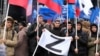 «Дядя приезжает, с моим папой спорит. Они чуть ли не ругаются». Как чужая война разделяет российских казахов
