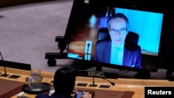 Izraelski ambasador Danny Danon sluša generalnog direktora IAEA Rafaela Grossija na ekranu na sjednici Savjeta bezbjednosti UN, New York, SAD, 13. juna