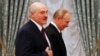 Belarus's strongman Alyaksandr Lukashenka and Russian President Vladimir Putin in 2021