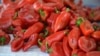 Bosnia and Herzegovina -- A market place in Bosnian capital Sarajevo (red peppers, pepper, fruit, fruits, vegetable, vegetables, seller, salesman, vender, vendor, agriculture), September 29, 2017