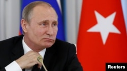 Володимир Путін
