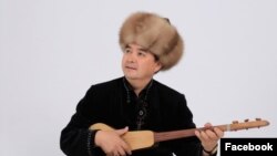 Шекербек Адылов.