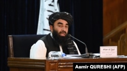 ذبیح الله مجاهد د يوې خبري غونډې په مهال 