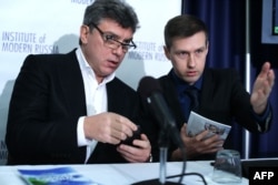 Борис Нємцов і Леонід Мартинюк у Вашингтоні на презентації доповіді про Олімпіаду в Сочі, 30 січня 2014 року