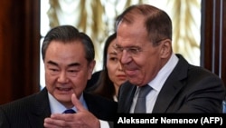 Vang Ji i Sergej Lavrov