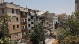 Iran - A building stands damaged in the aftermath of Israeli strikes, in Tehran, Iran, June 14, 2025. 