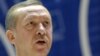 Türkiýäniň premýer-ministri Rejep Taýyp Erdogan Strasburgda Ýewropa Geňeşinde çykyş edýär, 13-nji aprel.