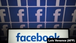 The logo of the US online social media and social networking service, Facebook.- generic